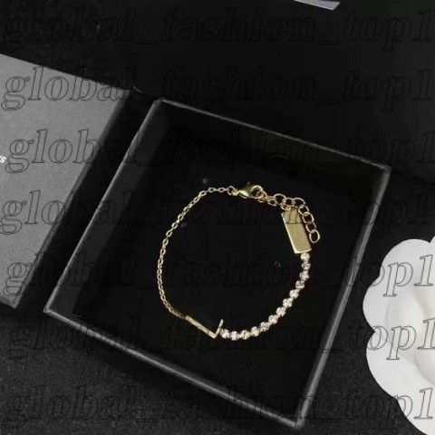 Luxury Yevs Sain Laurant Women's 14K Gold Plated Charm Bracelet with Crystal Letters