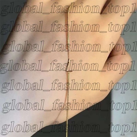 Luxury Yevs Sain Laurant Women's 14K Gold Plated Charm Bracelet with Crystal Letters