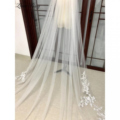 Elegant White Cathedral Bridal Veil with Lace Edges and Floral Decals
